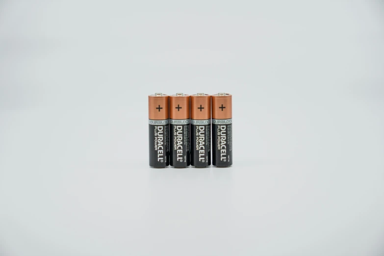3 batteries laying side by side