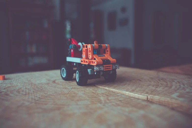 a toy truck sitting on top of a table