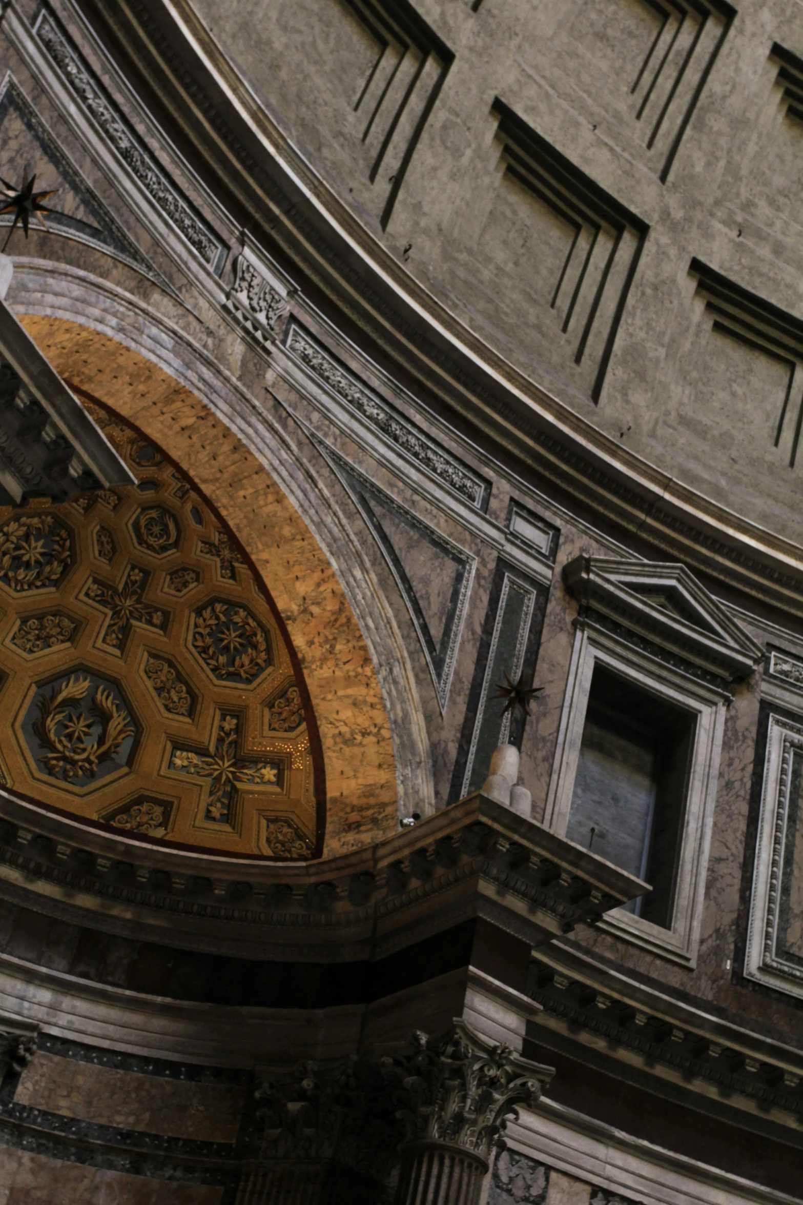 the ornate archway between two buildings is decorated with intricate decorations