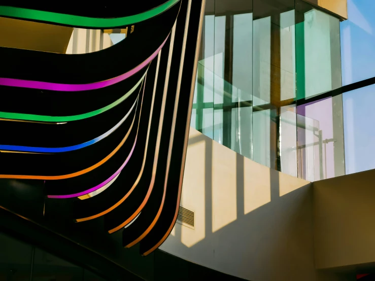 a black building with lots of striped windows