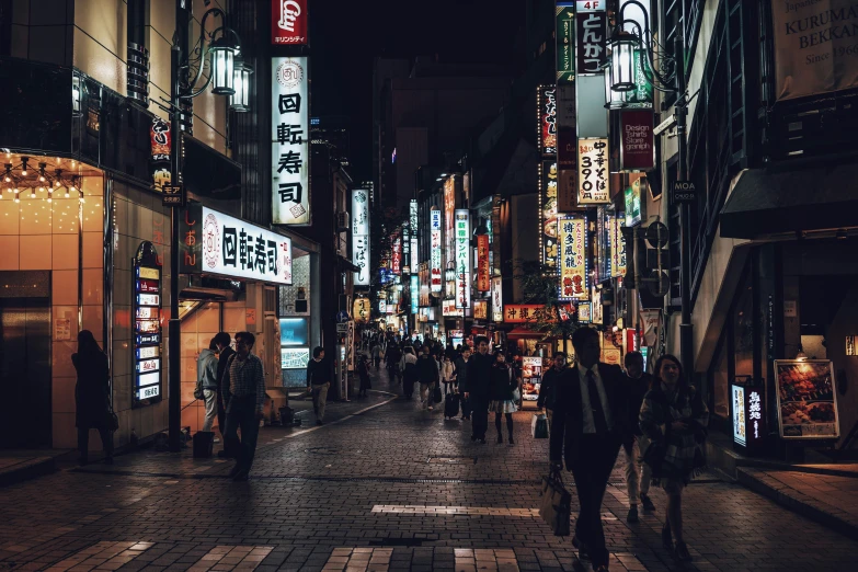 a street that has people walking in the city