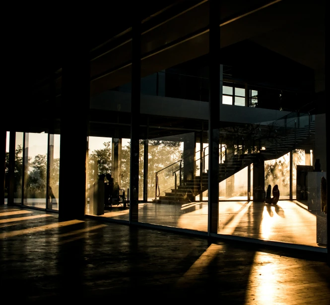 people stand near a building in the dark