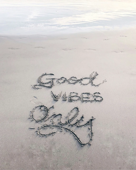 a handwritten quote saying good news at the beach