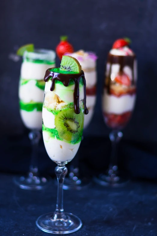 fruit, ice cream and chocolate on top of dessert