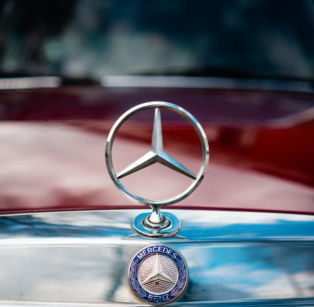 a close up s of a mercedes emblem