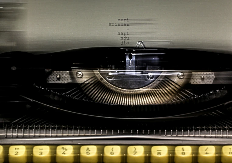 an image of a close up view of a typewriter with the words