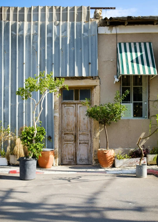 a street scene with an open door to another building