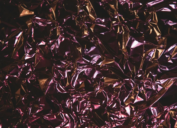 a close up view of purple tin foil