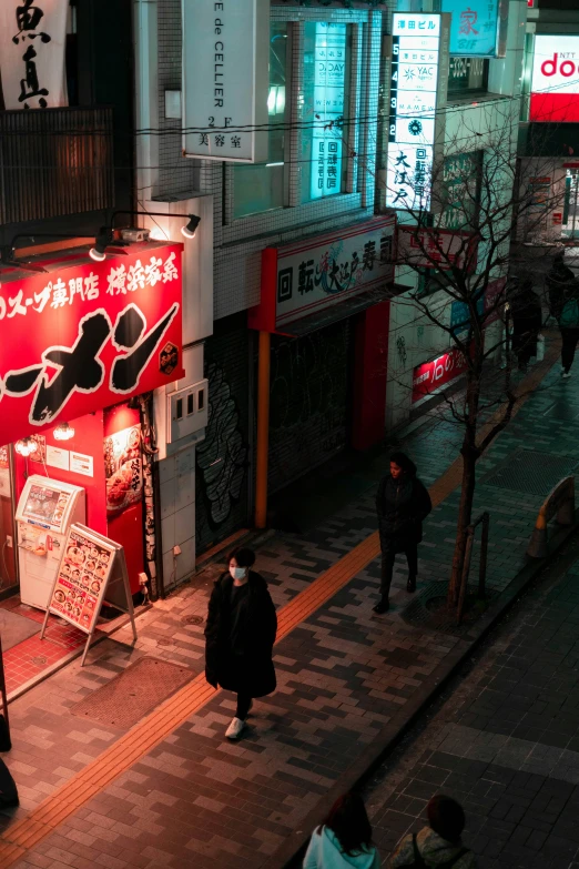 a person standing in the middle of a street