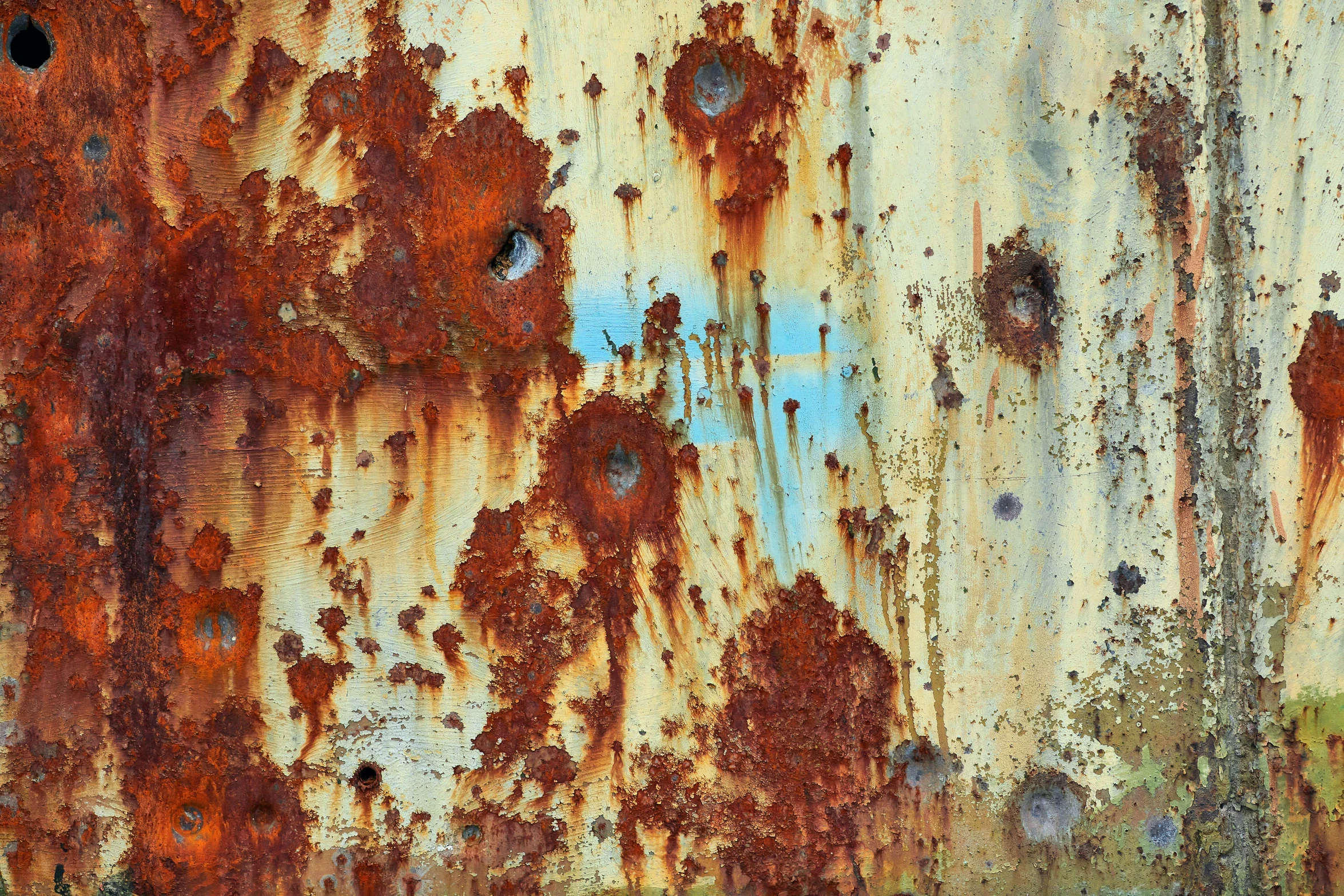 a rusted metal surface that has been peeling