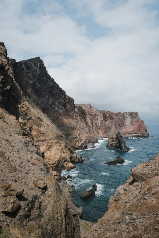 the view from a mountain looking out to sea