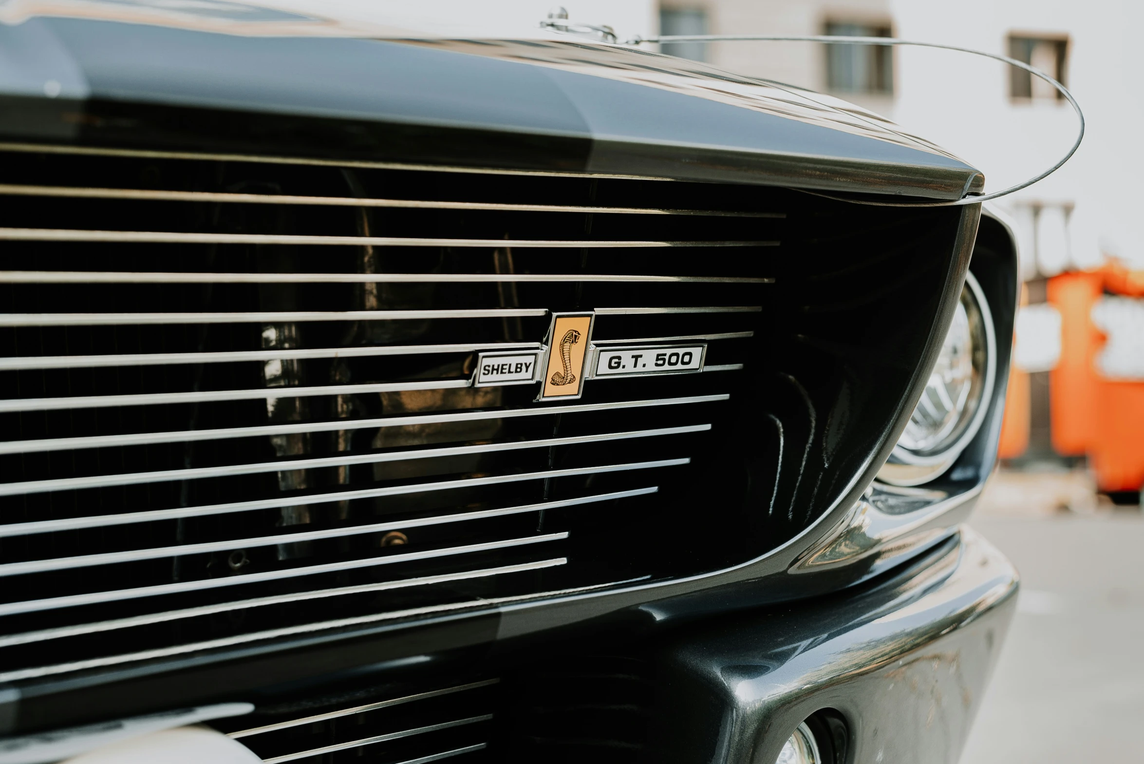 the front grills and emblem on an old car