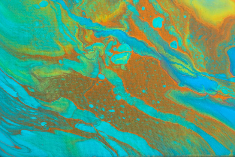 a painting with orange, blue, and green designs on it