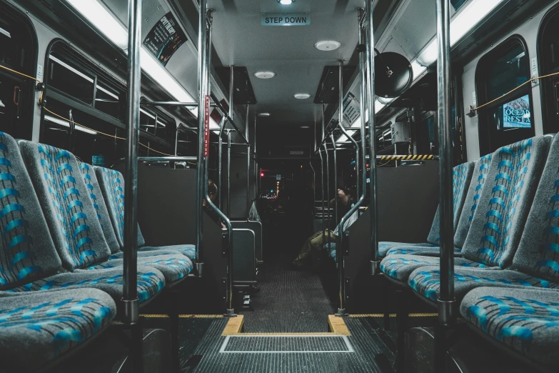 a view of an empty passenger bus from the inside