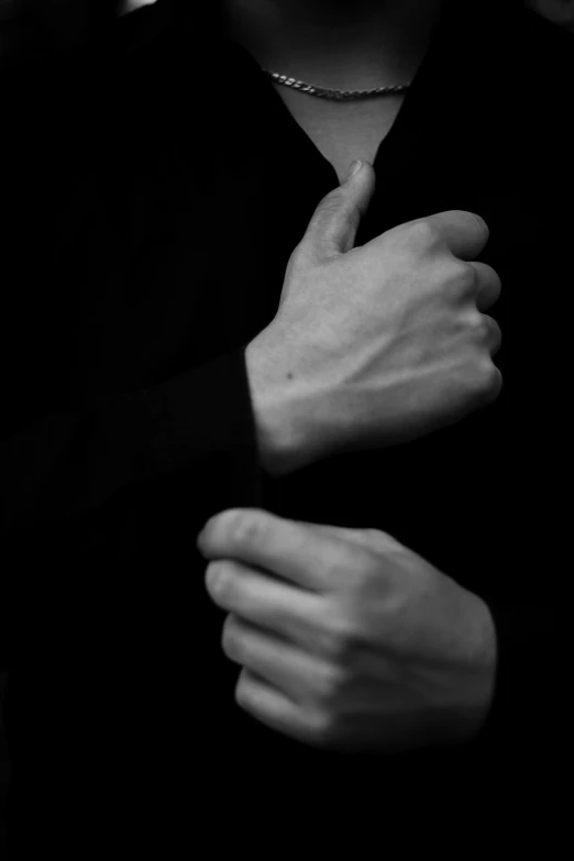 a close up of a person wearing a necklace