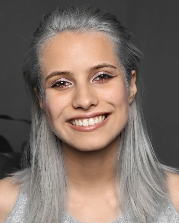 this is an image of a young woman smiling