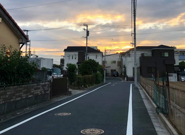 street in urban area with houses near to roadway