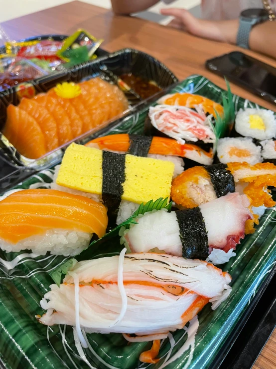 some kind of sushi platter on a table