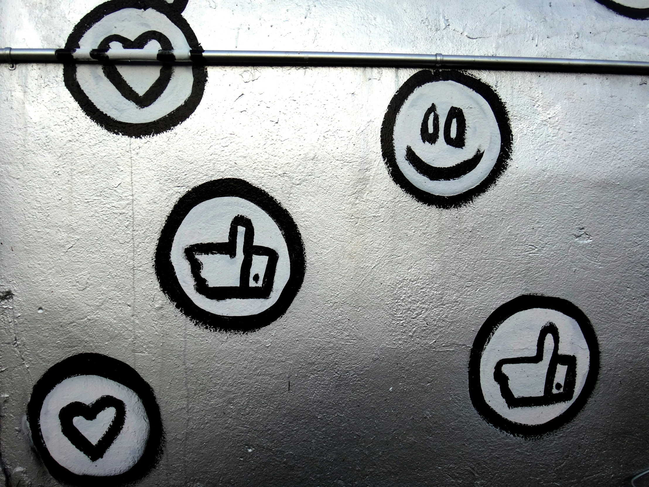 a group of stickers sitting on top of a refrigerator