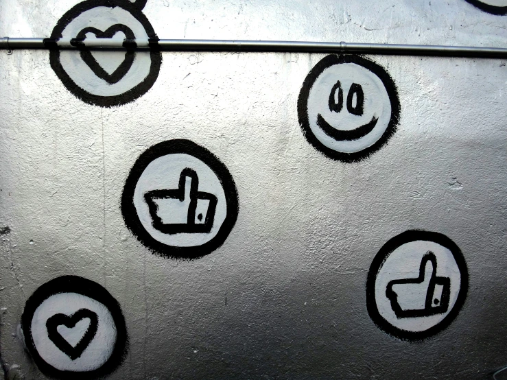 a group of stickers sitting on top of a refrigerator