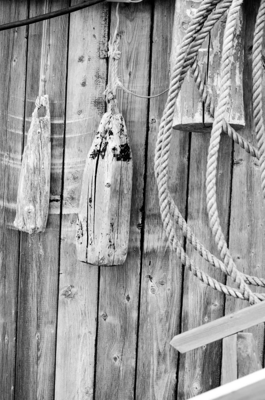 three decorative vessels are hanging on the wall