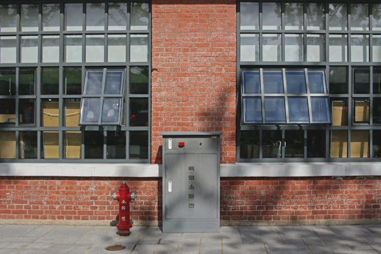 a fire hydrant in front of an office building