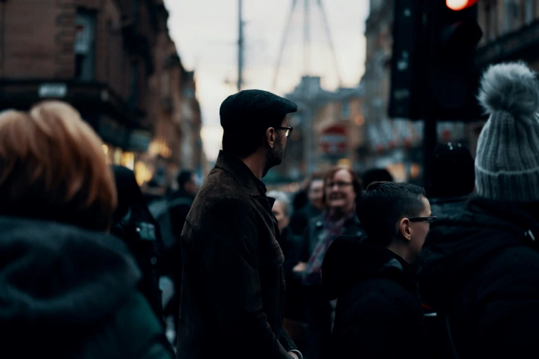 there is a man that is standing on the street