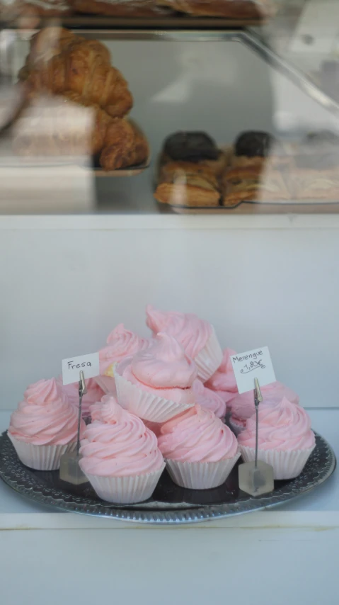 this is a display of various varieties of cupcakes