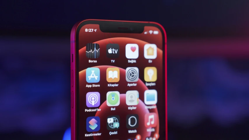 the new red iphone is displayed