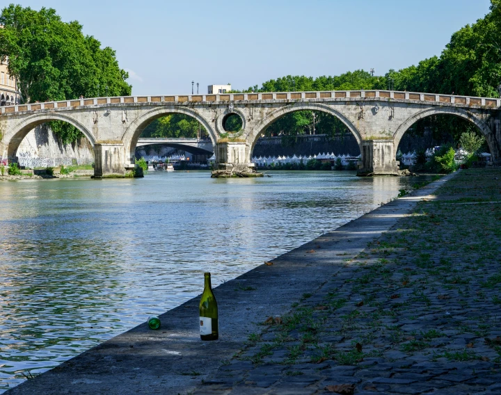 a city with buildings and a bridge over water