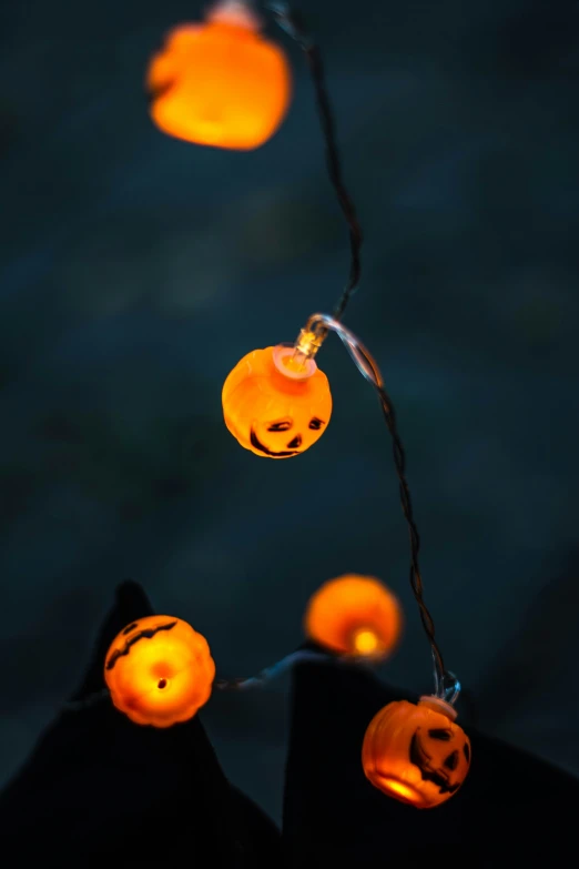 halloween light bulbs that are strung up on a string