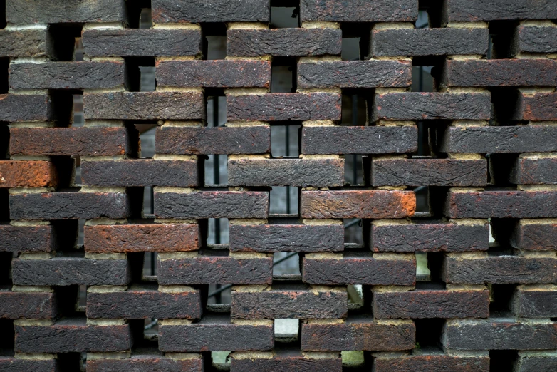 an old building with multiple rectangular brick bricks stacked