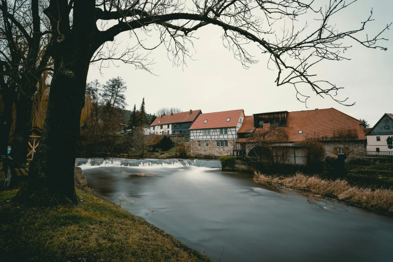 the house is located at the side of the river