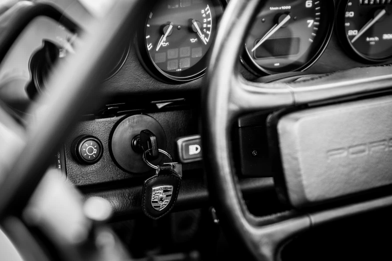 the dash board and gauges of a sports car