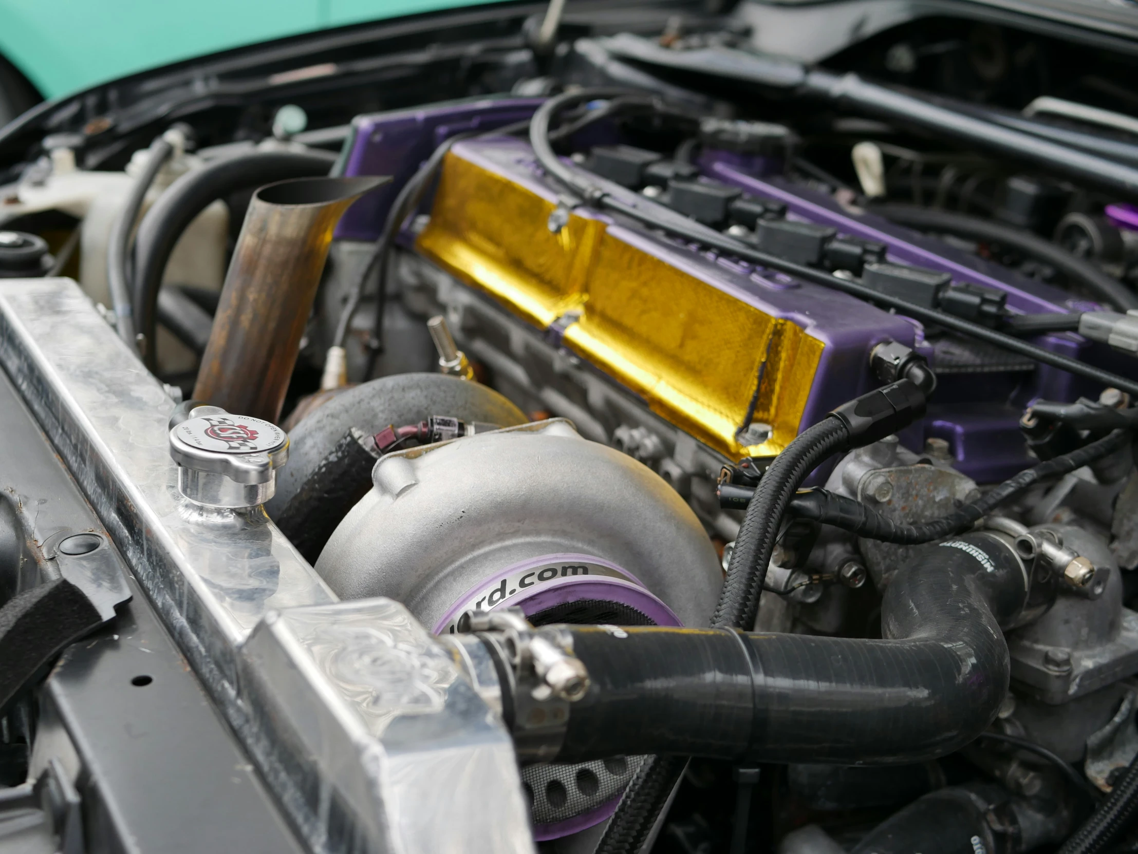 a close - up image of the engine of a sports car