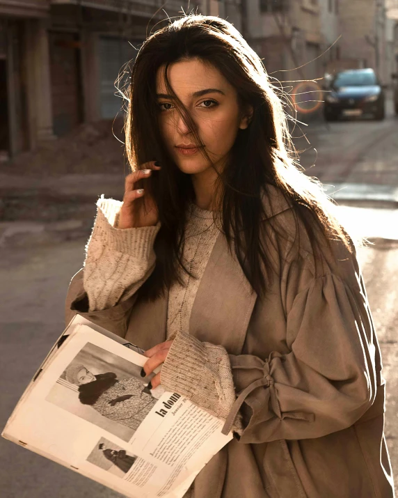 woman smoking on a cigarette while walking down the street