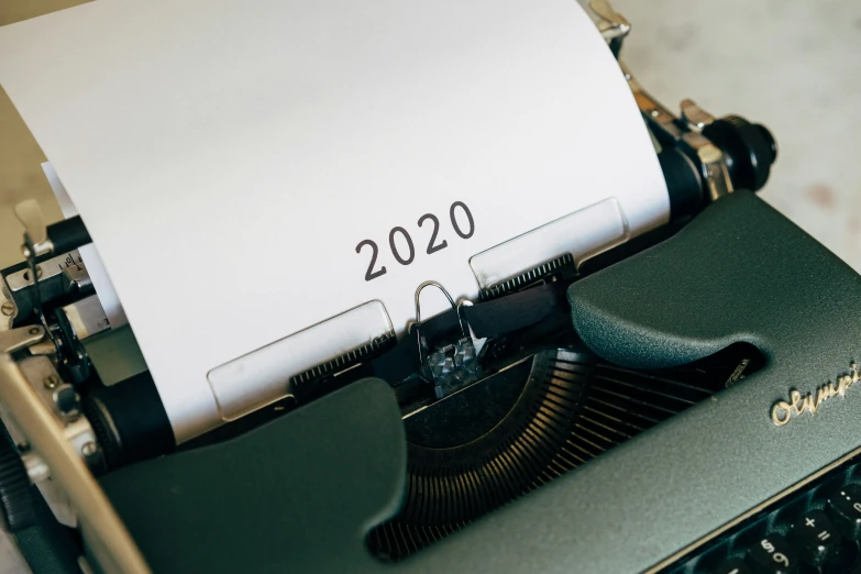 a closeup po of an old fashioned typewriter with the words written on it