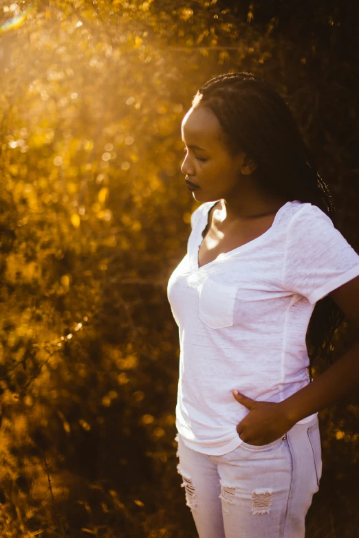 an image of a young woman posing in the sun