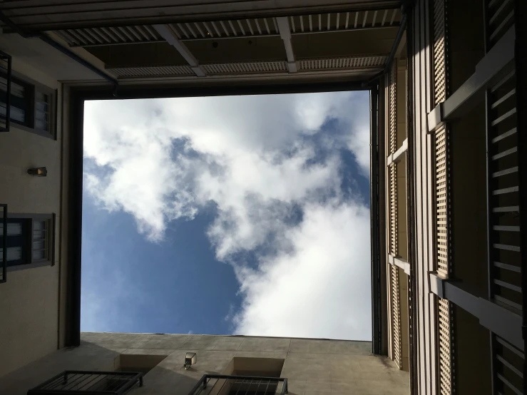 looking at a beautiful blue sky from an open window