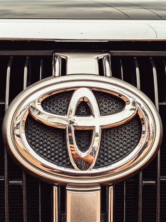 a toyota emblem on the grill of a car