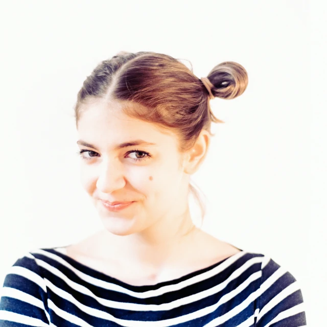 a woman with a bun in her hair