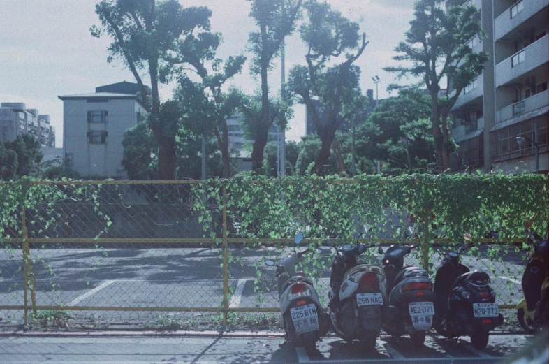 this is a parking lot that has motorcycles parked on it