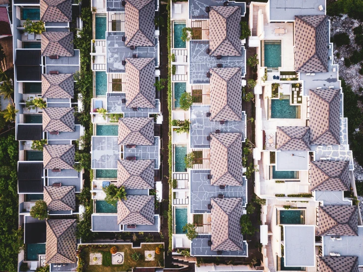 aerial view of rooftops with many different shades of roofs