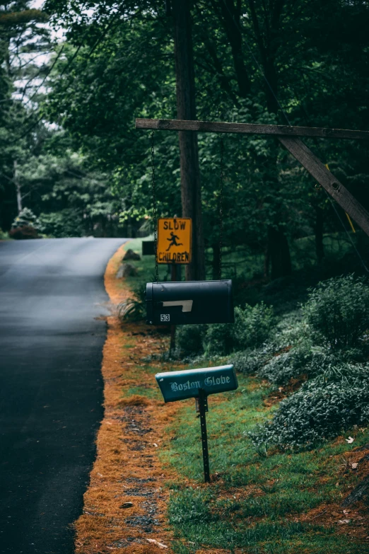 the mailbox is at the end of the road by the sign