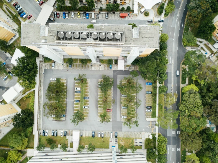 an aerial view shows a large park with car parking spaces