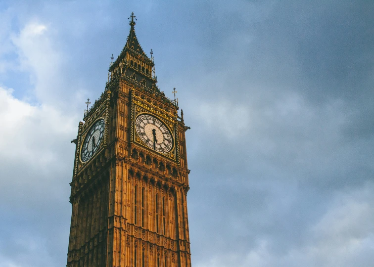 the big ben clock tower towering over the city of london