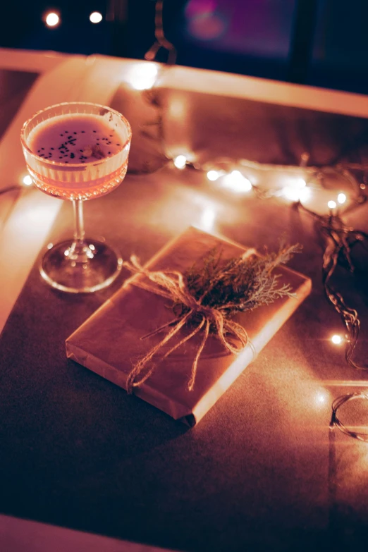 a drink and a box are on the table