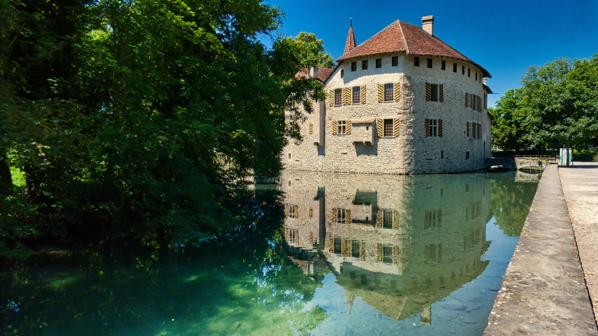 the house and the river are beautiful