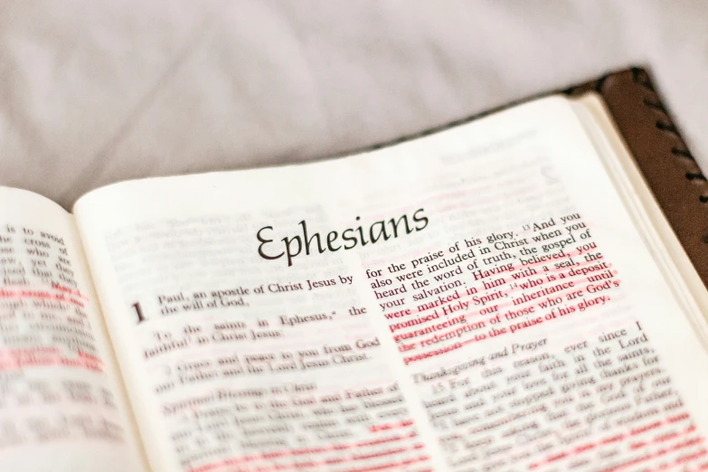 an open book with the word ephesians printed on it