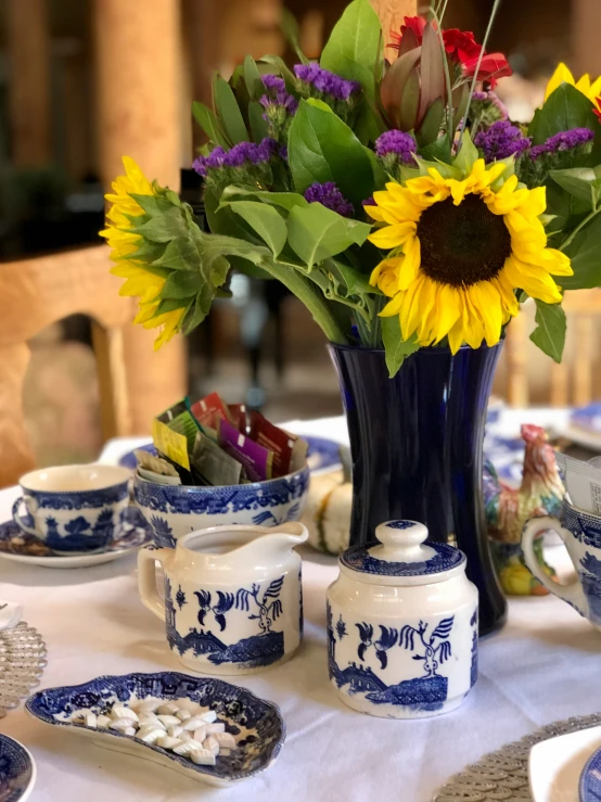 an elaborately decorated vase with colorful flowers